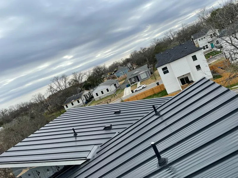 Standing seam metal roof panels with vents for Skylight Repair in Elgin